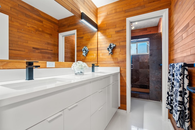 101 Dolphin Dr, Saint Augustine, FL 32080 - bathroom with double vanity, a sink, and wood walls
