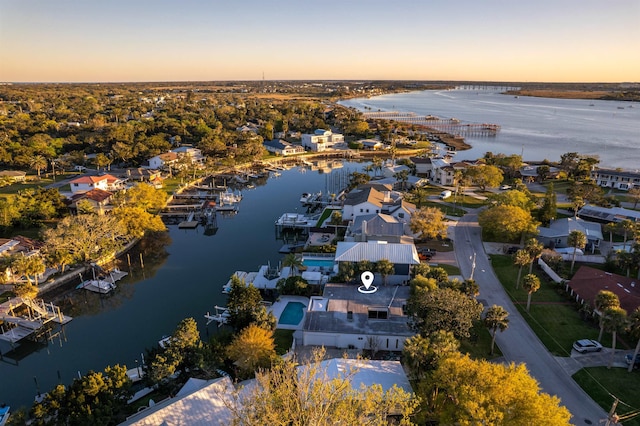 101 Dolphin Dr, Saint Augustine, FL 32080 - aerial view at dusk featuring a water view