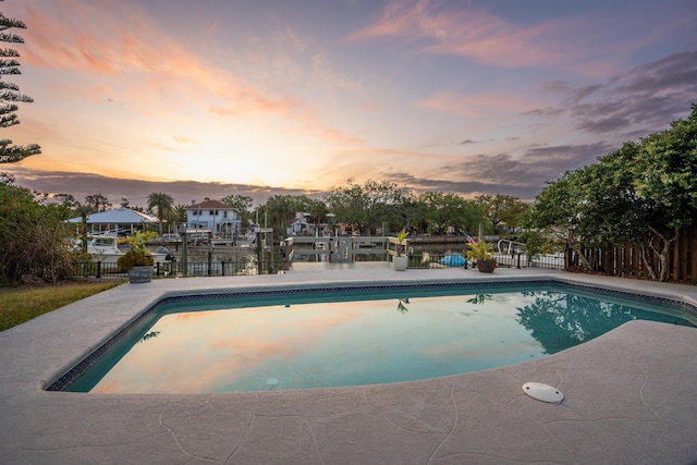 101 Dolphin Dr, Saint Augustine, FL 32080 - view of swimming pool with a patio, a boat dock, fence, and a fenced in pool