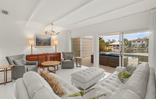 101 Dolphin Dr, Saint Augustine, FL 32080 - living area with visible vents, beam ceiling, and an inviting chandelier