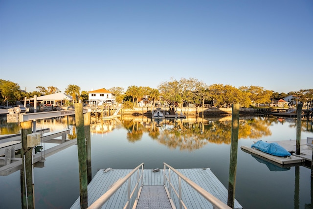 101 Dolphin Dr, Saint Augustine, FL 32080 - dock area featuring a water view and a residential view