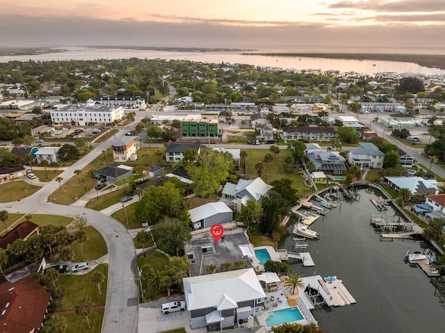101 Dolphin Dr, Saint Augustine, FL 32080 - aerial view at dusk featuring a water view