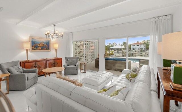 101 Dolphin Dr, Saint Augustine, FL 32080 - living area with visible vents, beam ceiling, and an inviting chandelier
