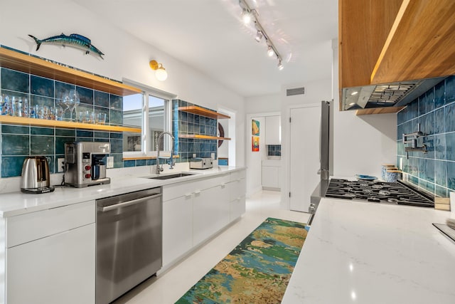 101 Dolphin Dr, Saint Augustine, FL 32080 - kitchen with a sink, open shelves, stainless steel dishwasher, visible vents, and decorative backsplash