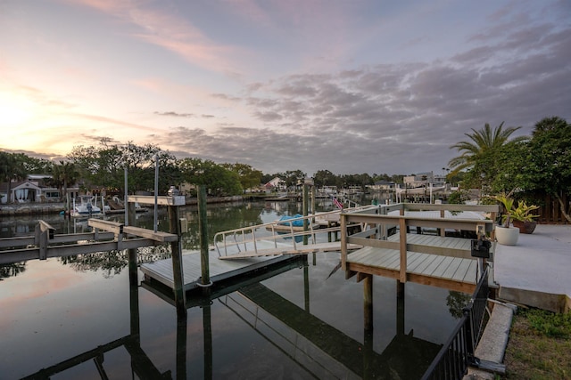 101 Dolphin Dr, Saint Augustine, FL 32080 - view of dock featuring boat lift and a water view