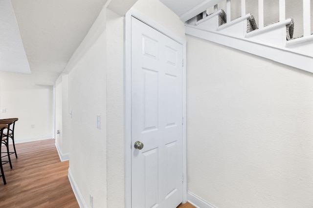 91 Saint Benedict St, Saint Augustine, FL 32084 - corridor featuring baseboards and wood finished floors