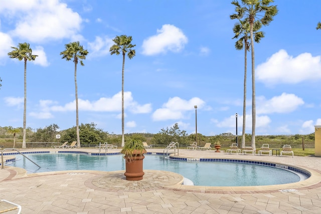 community pool featuring a patio