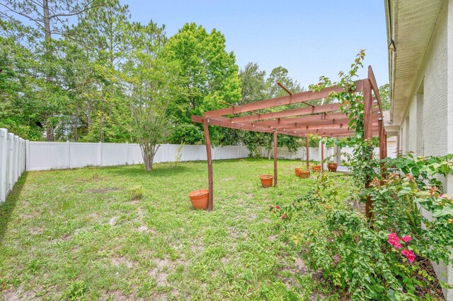 17 Porter Ln, Palm Coast, FL 32164 - view of yard featuring a pergola