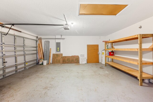17 Porter Ln, Palm Coast, FL 32164 - garage featuring electric panel and a garage door opener