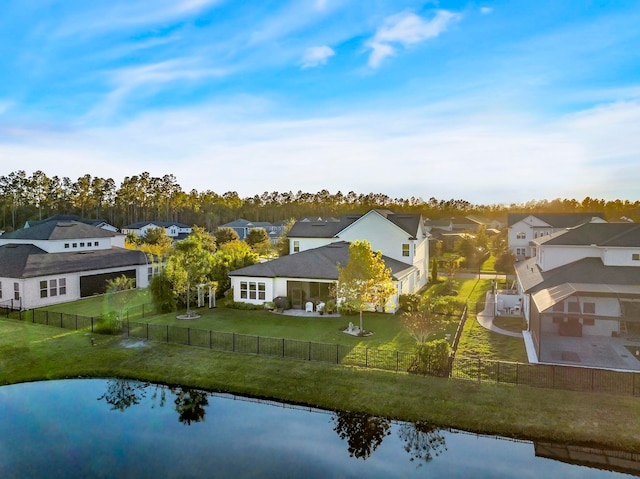 drone / aerial view with a water view