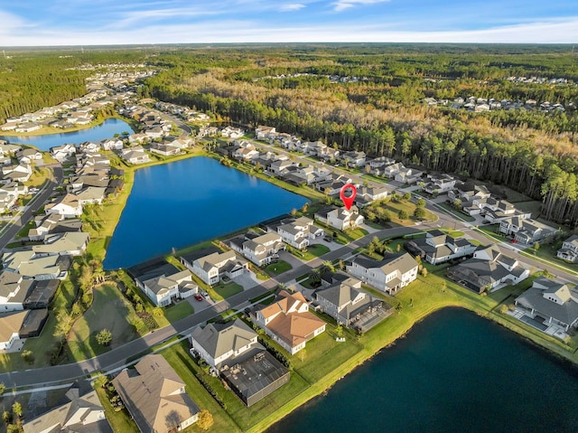 drone / aerial view featuring a water view