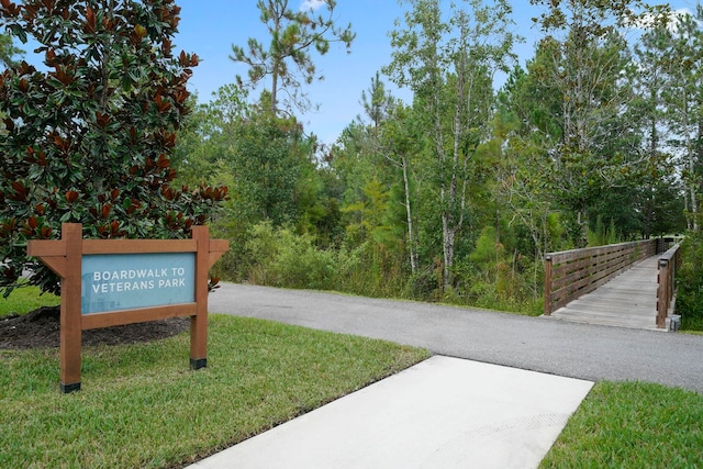 view of community featuring a lawn