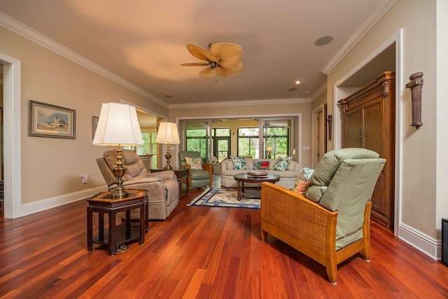 485 Ocean Forest Dr, Saint Augustine, FL 32080 - living area featuring ornamental molding, dark wood-type flooring, baseboards, and ceiling fan