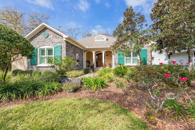 485 Ocean Forest Dr, Saint Augustine, FL 32080 - view of front of house with stone siding and stucco siding