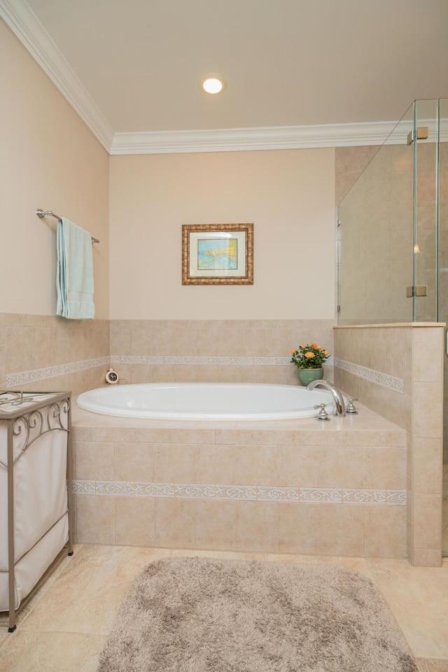 485 Ocean Forest Dr, Saint Augustine, FL 32080 - full bathroom with a tile shower, tile patterned flooring, ornamental molding, and a garden tub