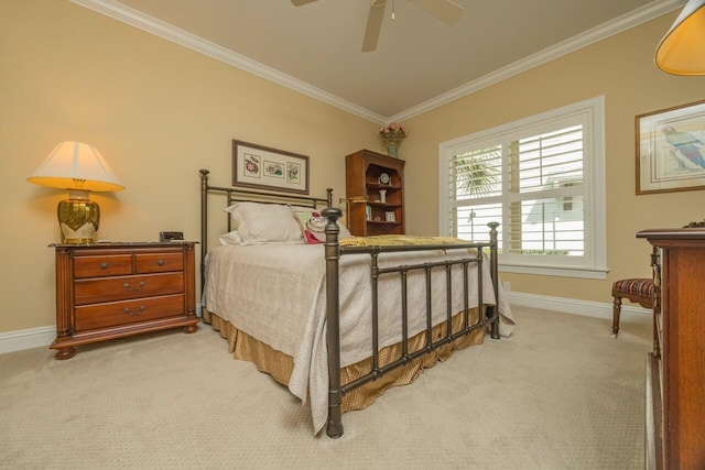 485 Ocean Forest Dr, Saint Augustine, FL 32080 - bedroom with ornamental molding, a ceiling fan, light carpet, and baseboards