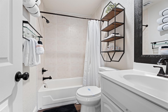 bathroom with vanity, shower / bath combination with curtain, toilet, and visible vents