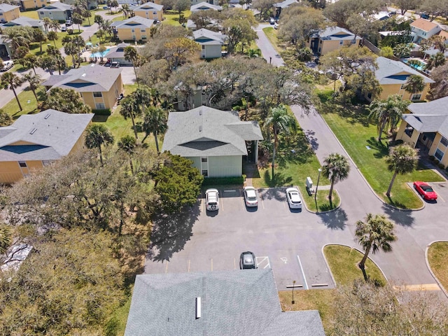 birds eye view of property with a residential view