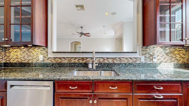 kitchen featuring ceiling fan, sink, tasteful backsplash, stainless steel dishwasher, and crown molding