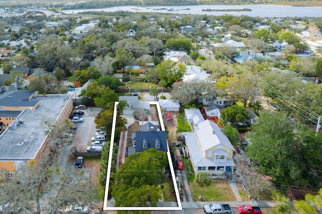 aerial view featuring a residential view and a water view