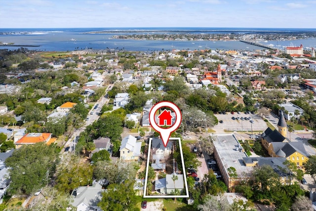 aerial view featuring a water view and a residential view