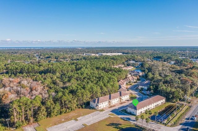 aerial view featuring a view of trees