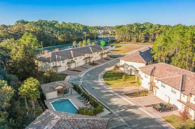 drone / aerial view with a water view