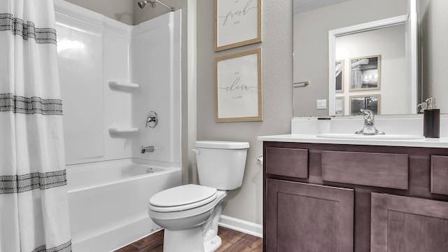 804 Grand Reserve Dr, Bunnell, FL 32110 - bathroom with vanity, shower / tub combo with curtain, wood finished floors, toilet, and baseboards