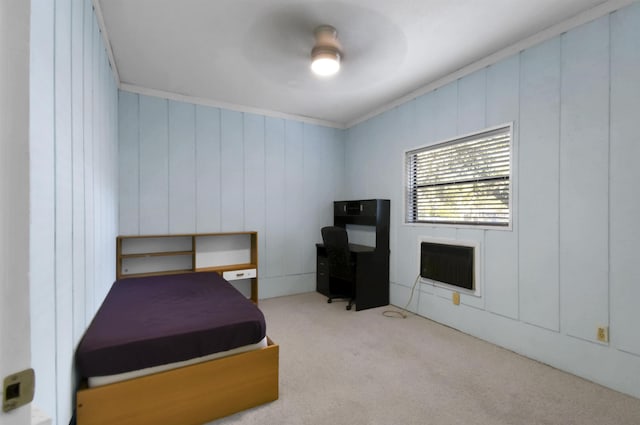 carpeted bedroom with ceiling fan and crown molding