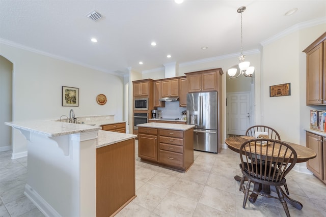 kitchen featuring a spacious island, appliances with stainless steel finishes, ornamental molding, a sink, and under cabinet range hood