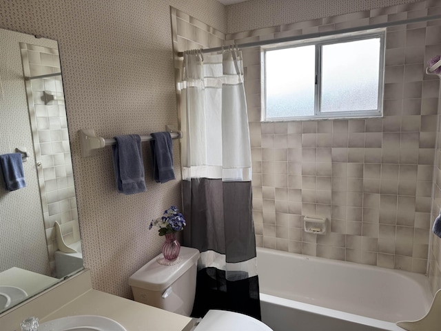 full bathroom with toilet, vanity, and shower / bathtub combination with curtain