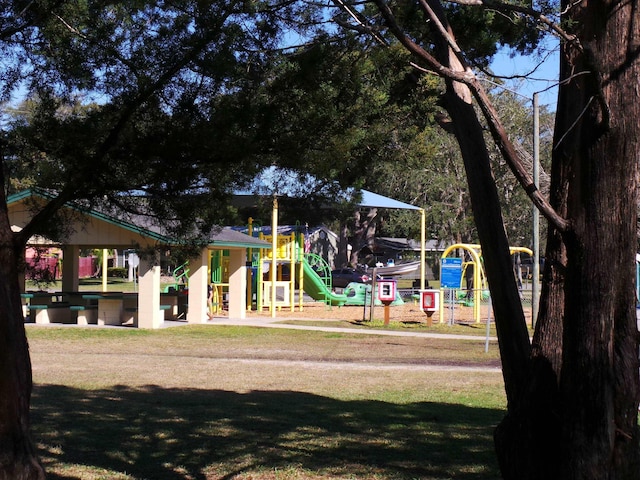 view of play area featuring a lawn