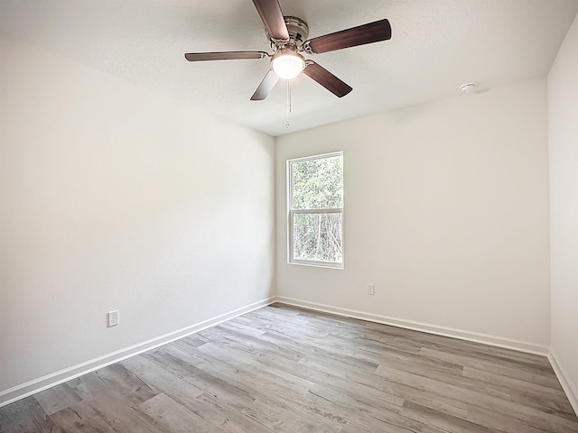 921 Helen St, Saint Augustine, FL 32084 - unfurnished room featuring wood finished floors, baseboards, and ceiling fan