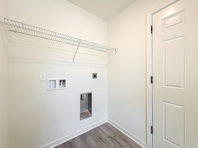 921 Helen St, Saint Augustine, FL 32084 - washroom with electric dryer hookup, baseboards, washer hookup, and dark wood-style flooring