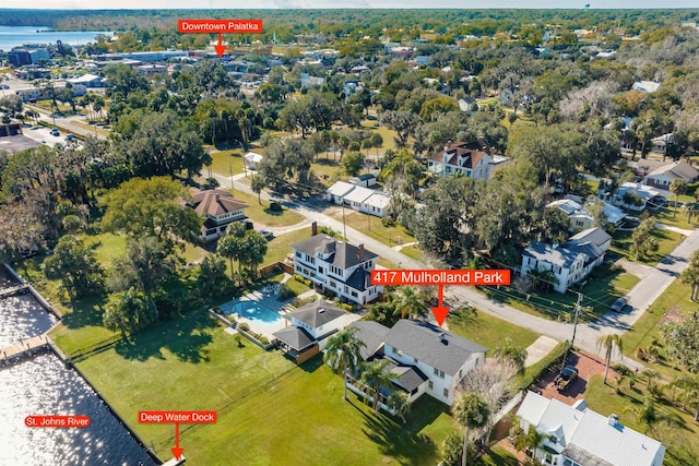 birds eye view of property featuring a water view