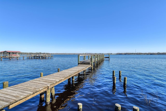 view of dock with a water view