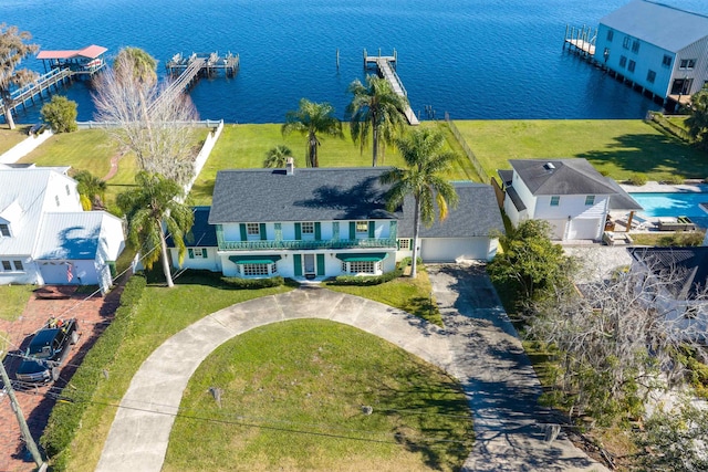 bird's eye view with a water view