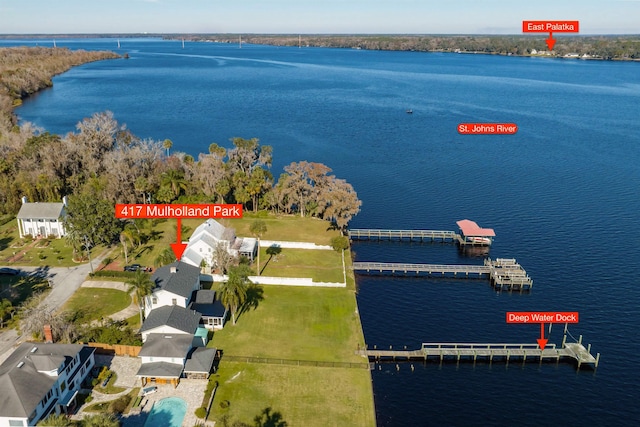 birds eye view of property featuring a water view