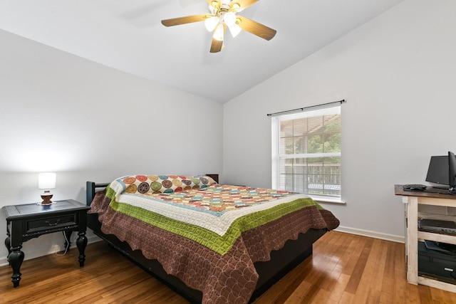 bedroom featuring wood-type flooring, ceiling fan, and lofted ceiling