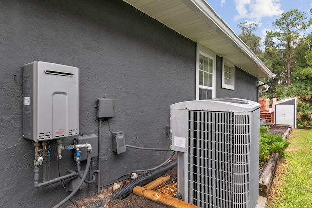 exterior details with cooling unit and water heater