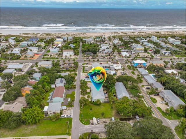 drone / aerial view with a view of the beach and a water view