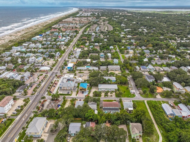 bird's eye view with a view of the beach and a water view