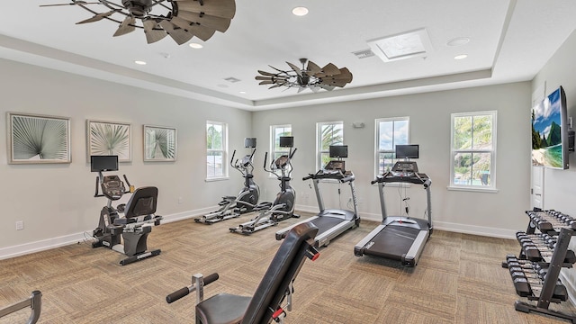798 Grand Reserve Dr, Bunnell, FL 32110 - workout area with carpet, a tray ceiling, recessed lighting, baseboards, and ceiling fan