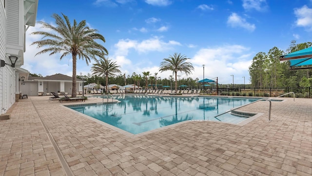 798 Grand Reserve Dr, Bunnell, FL 32110 - community pool featuring fence and a patio area