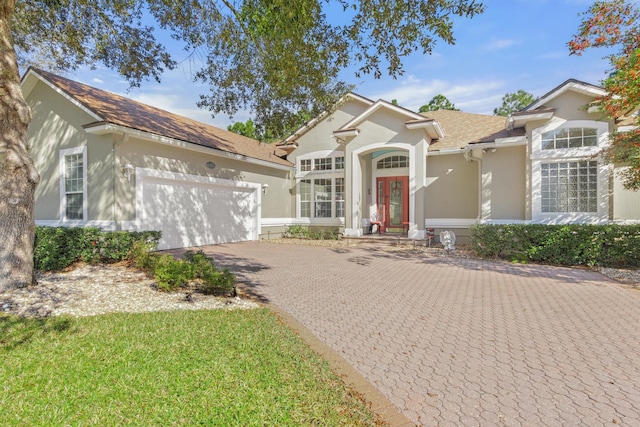 view of front of property with a garage