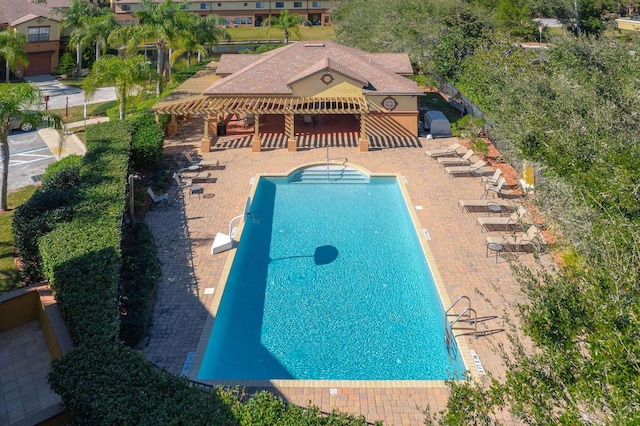 view of swimming pool featuring a patio