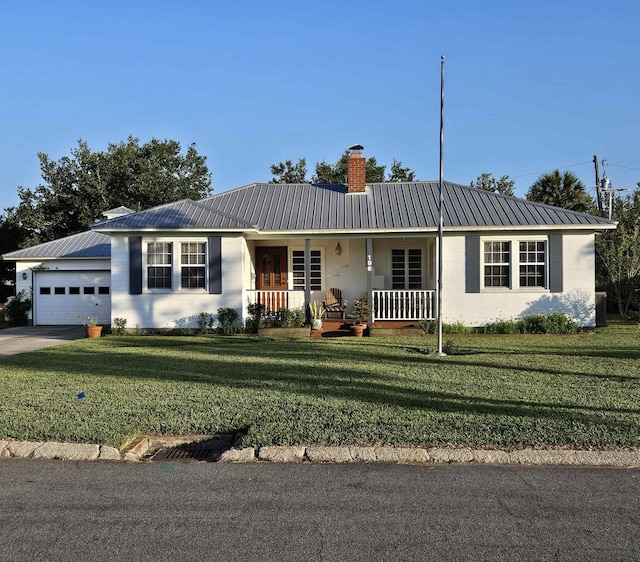 ranch-style home with a porch, a garage, and a front lawn