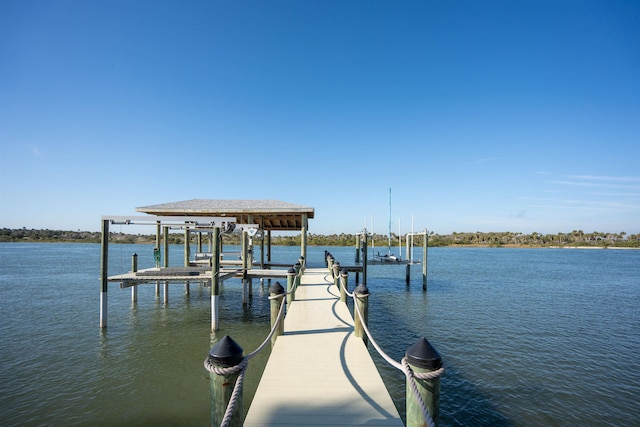 dock area featuring a water view and boat lift