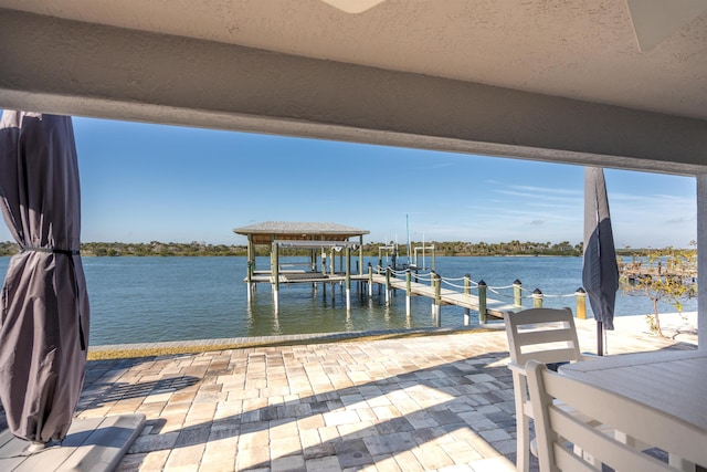 view of dock with a water view and boat lift