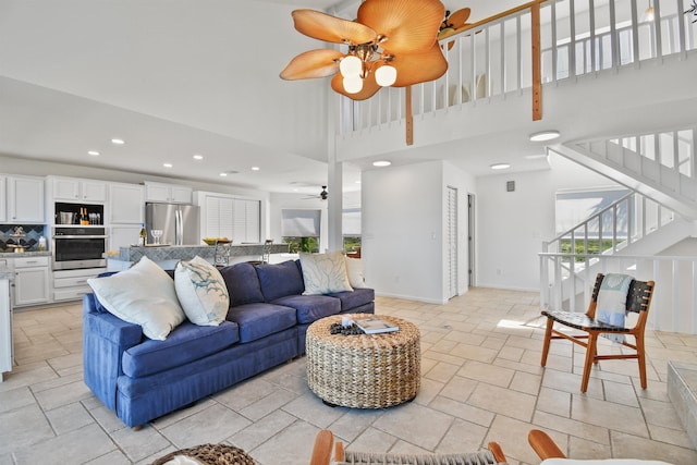 2749 S Ponte Vedra Blvd, Ponte Vedra Beach, FL 32082 - living room featuring a ceiling fan, stairs, a towering ceiling, and recessed lighting